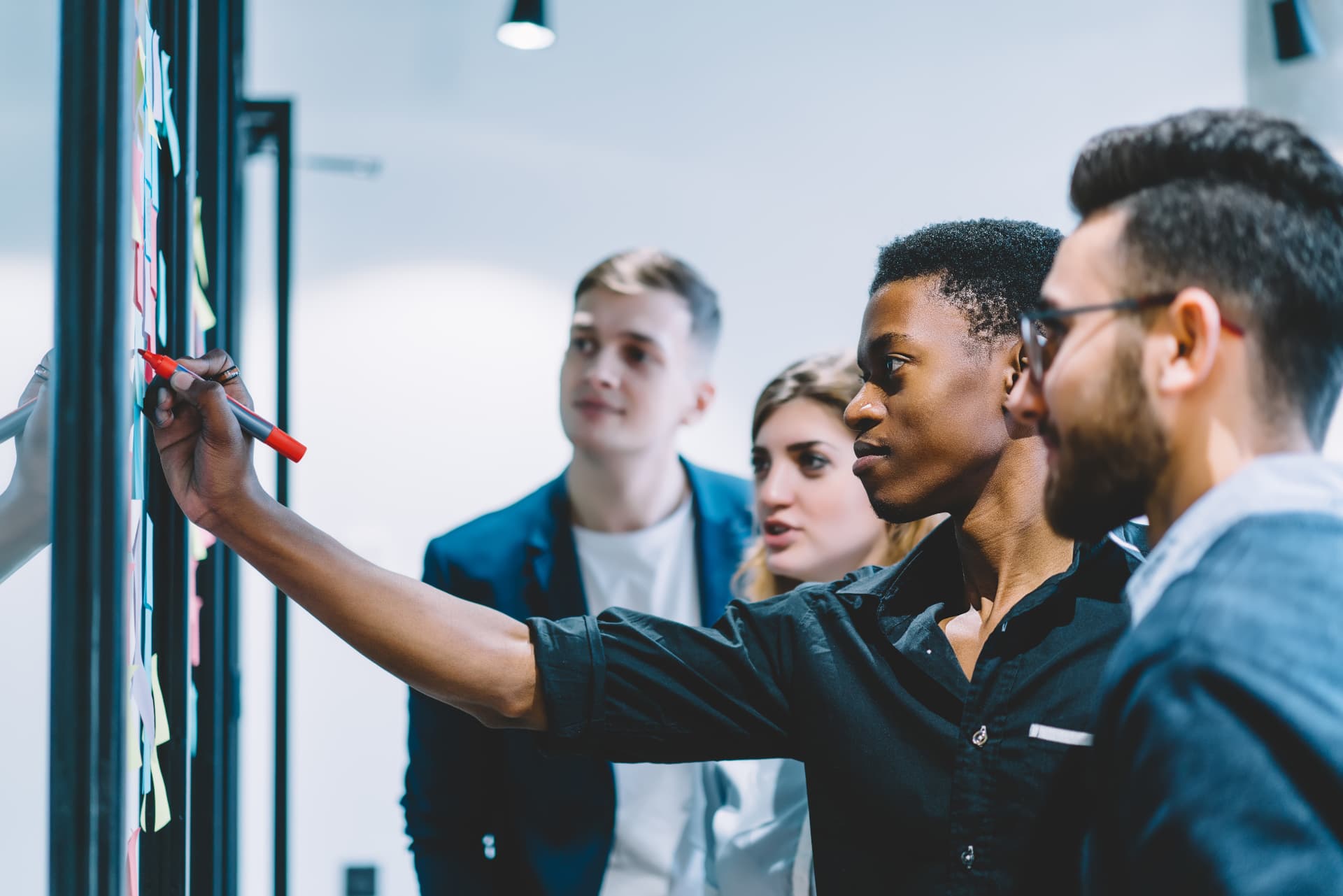 A group of learners working together at a planning board