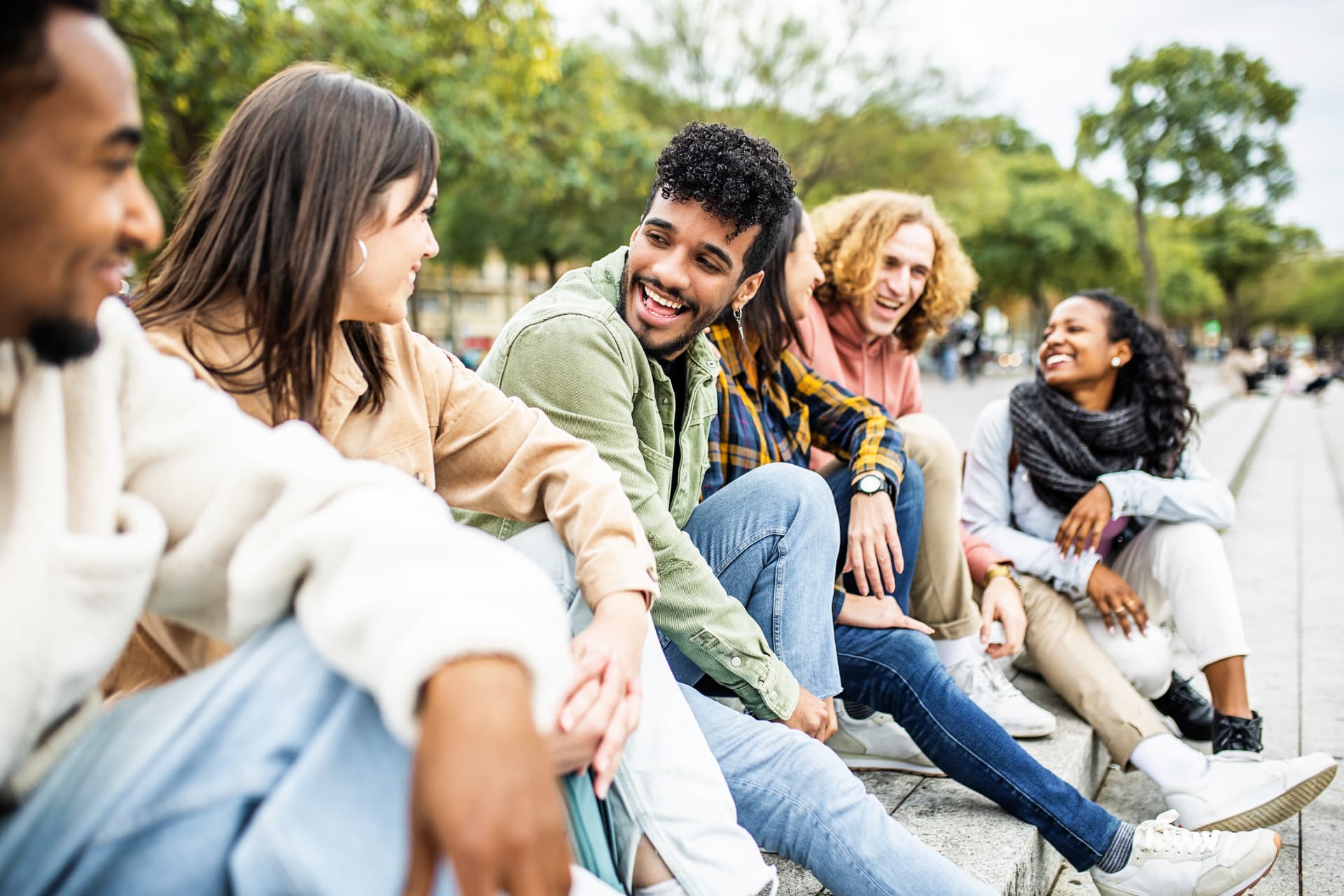Youth Worker apprentices discussing their studies outdoors